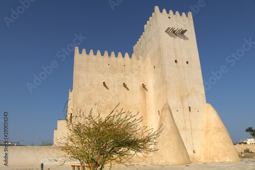 View of Barzan Towers(Umm Salal Mohammed Towers) were constructed in late 19th century and rebuilt in 1910 by Sheikh Mohammed bin Jassim Al Thani in Doha, Qatar  photo