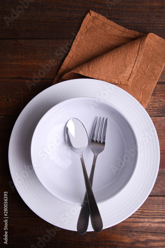 Bild auf Leinwand Two clean plates and cutlery