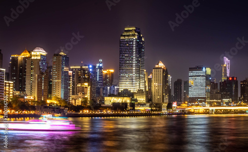 Along the Zhujiang River and modern building of financial district at night in guangzhou china. © siewwy84