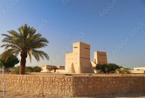 View of Barzan Towers(Umm Salal Mohammed Towers) were constructed in late 19th century and rebuilt in 1910 by Sheikh Mohammed bin Jassim Al Thani in Doha, Qatar  photo