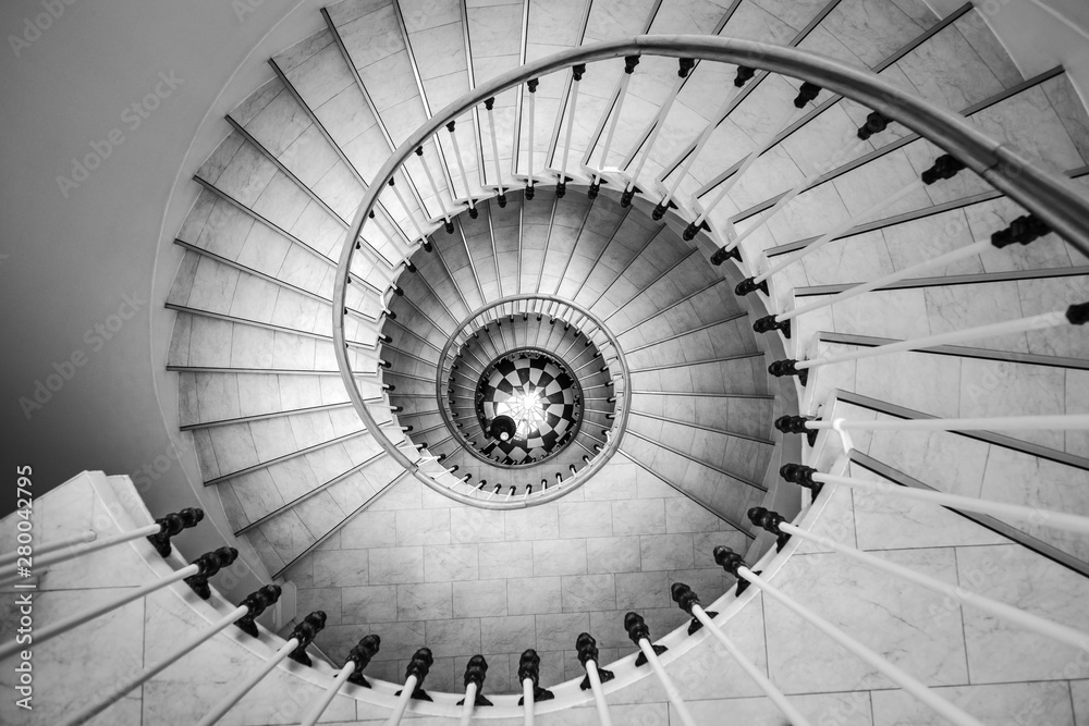 Beautiful circular staircase in old house, snail geometry - obrazy, fototapety, plakaty 