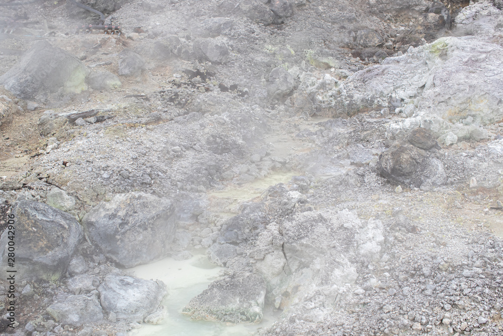stone or rock with hell hot springs located at active volcano mountain. stone or rock with hell hot springs located at active volcano mountain.