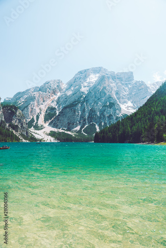 view of braies lake in alps mountains