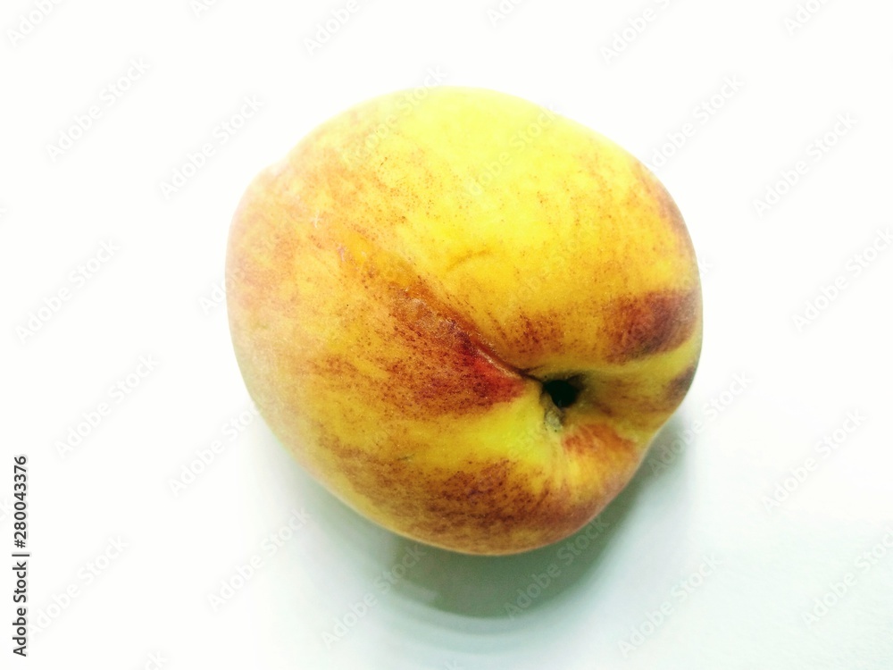 A picture of peach isolated on white background A picture of peach isolated on white background