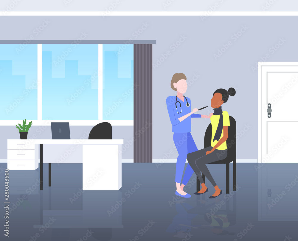 female doctor examining throat of african american woman patient by depressor sore medicine healthcare concept modern hospital room interior horizontal full length flat
