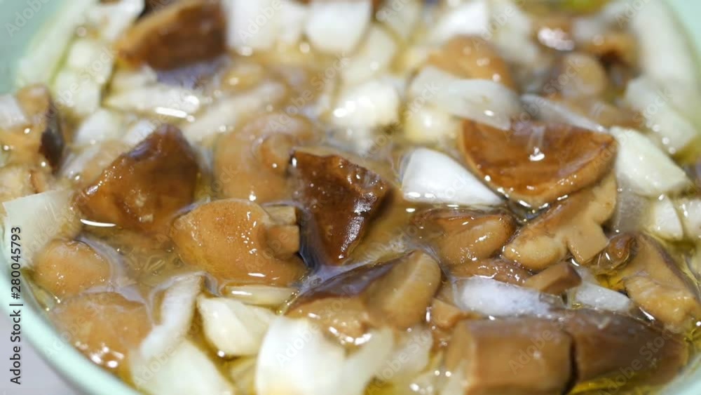 fresh mushrooms pickled with onions and spices fresh mushrooms pickled with onions and spices