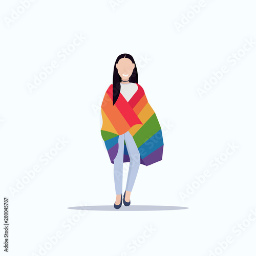 Woman holding rainbow flag love parade LGBT