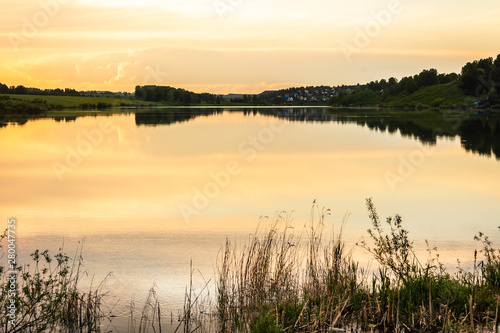 sunset on the lake.water surface of the lake