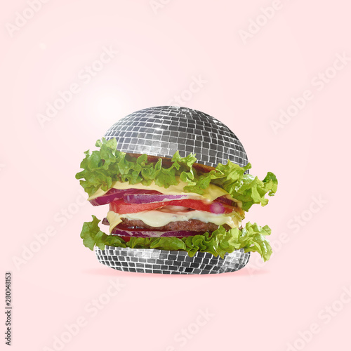 Food as fast as a disco dance. A burger as an discoball with salad, potato and meat. Negative space to insert your text. Modern design. Contemporary art collage. An alternative view of street food.