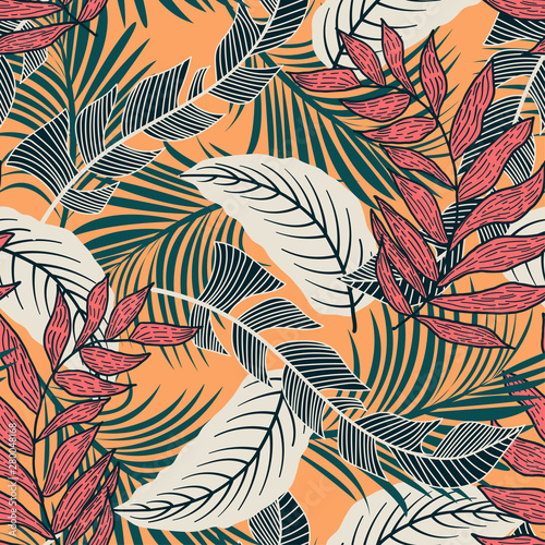 Trend seamless pattern with colorful tropical leaves and plants on yellow background. Vector design. Jungle print. Flowers background. Printing and textiles. Exotic tropics. Fresh design. © EltaMax99