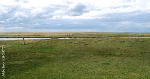 Laesoe / Denmark: Tidal creek in the wide salt marsh landscape on „Kringelroen“ in the south of the Kattegat island