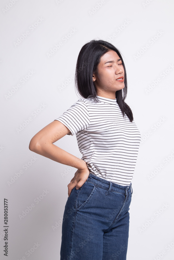 Young Asian woman got back pain. Young Asian woman got back pain.