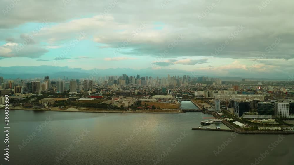 Cityscape of Makati, the business center of Manila, view from above. Asian metropolis at sunset. Travel vacation concept. Cityscape of Makati, the business center of Manila, view from above. Asian metropolis at sunset. Travel vacation concept.