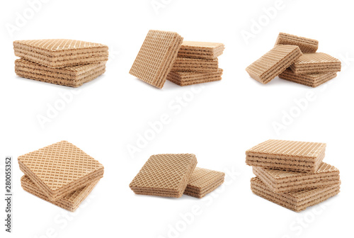 Set of delicious crispy wafers on white background