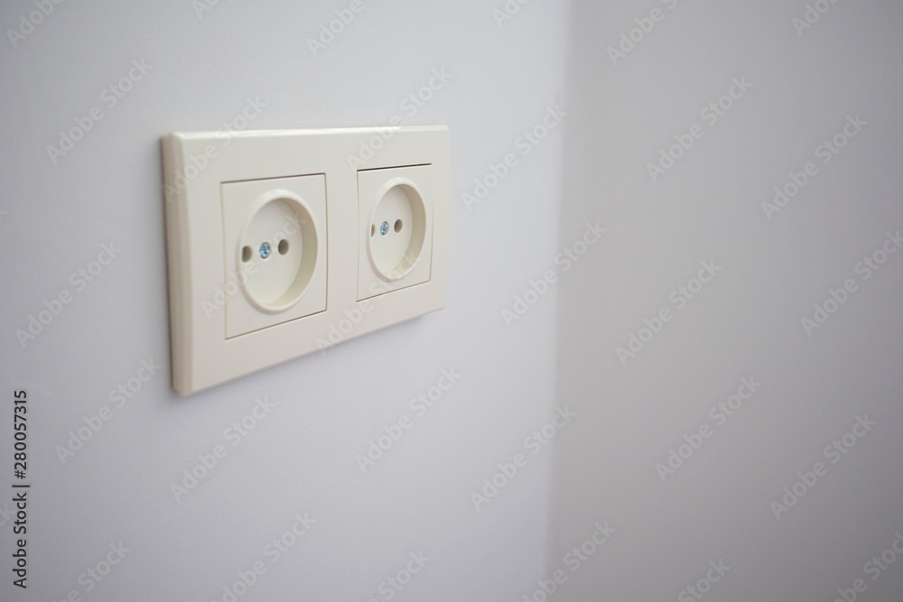 beautiful white European sockets in a flat wall beautiful white European sockets in a flat wall