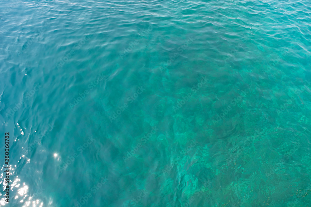 Blue sea water blurred ripple background. Aegean Sea, Turkey Blue sea water blurred ripple background. Aegean Sea, Turkey
