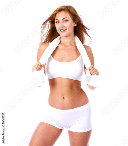 beautiful blonde woman in white fitness clothing