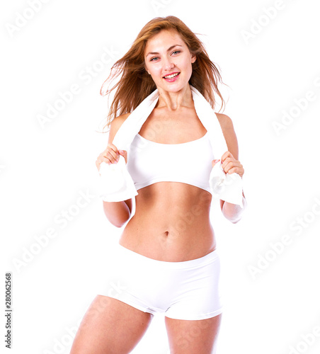 beautiful blonde woman in white fitness clothing