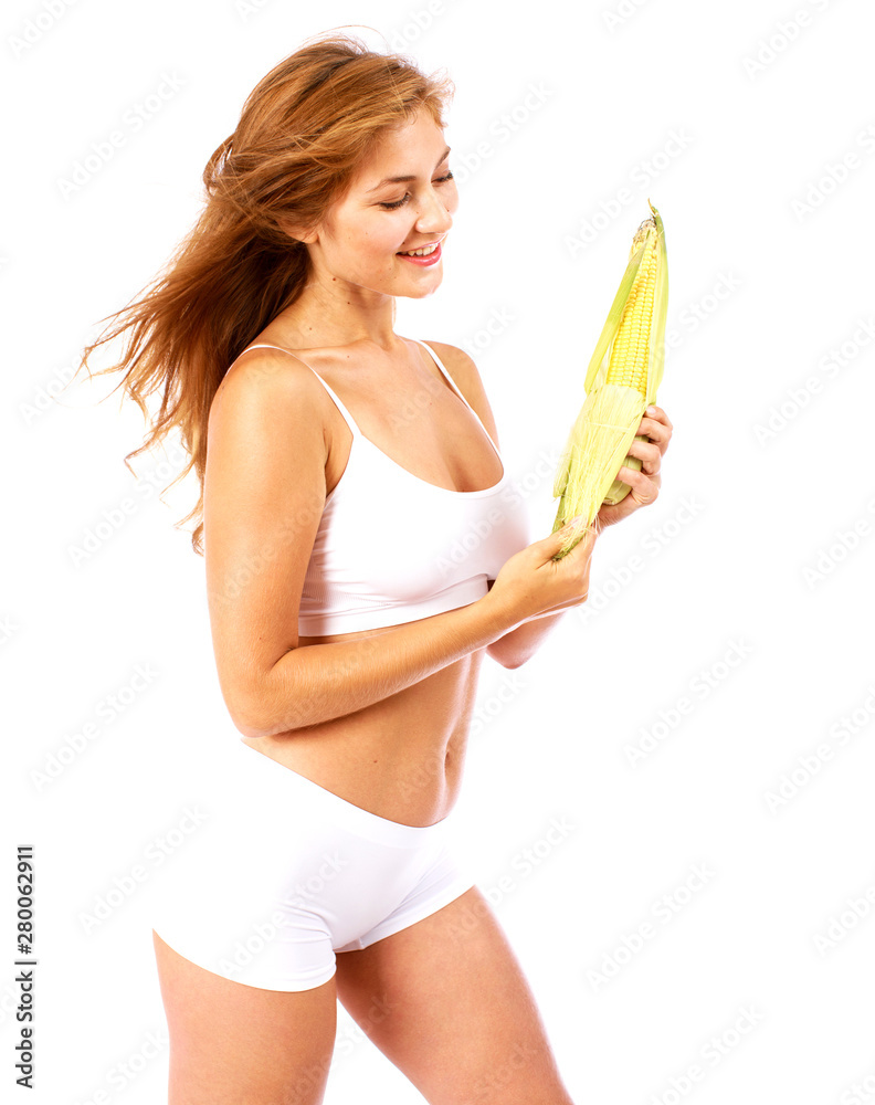 Young beautiful blonde woman in white fitness clothing Young beautiful blonde woman in white fitness clothing
