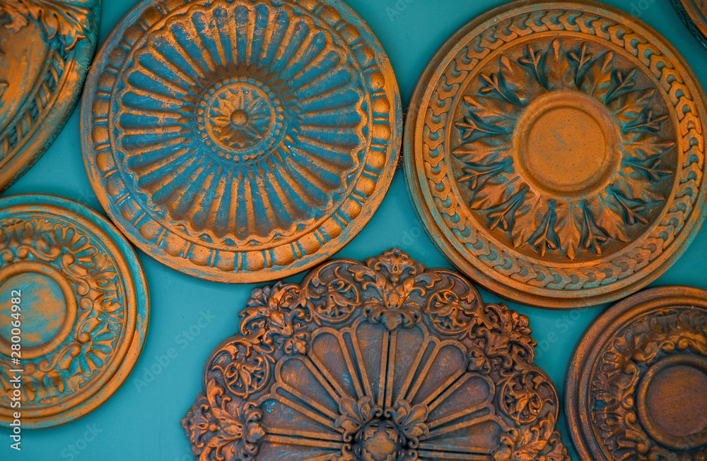 Clay figured plates on the wall