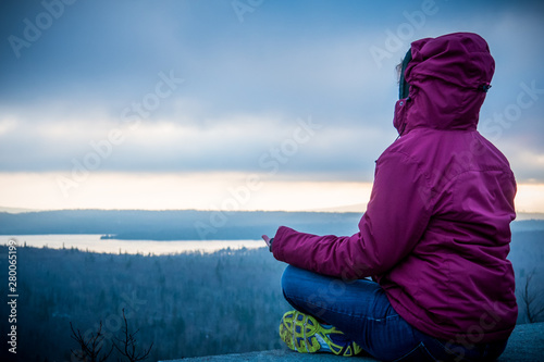 Woman meditation on mountain 