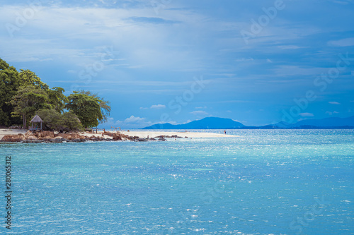 The image of the sea of Thailand Looks clean and bright With the color of the sea, the sky, and the freshness of the green tropical plants