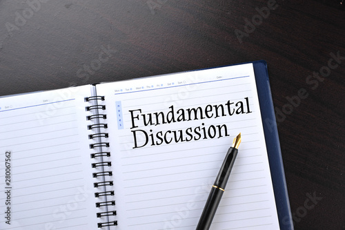 Notebook with fountain pen written word Fundamental Discussion © shahrilkhmd
