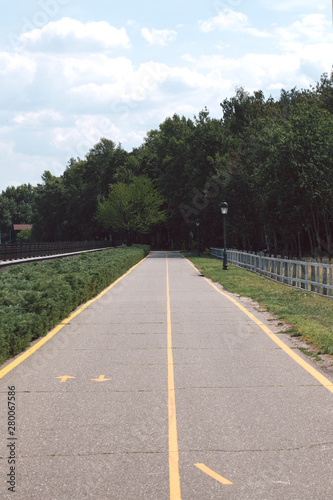 long road in a large park