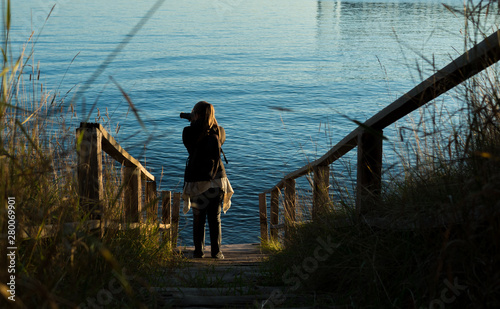 Photographer at the lake shore