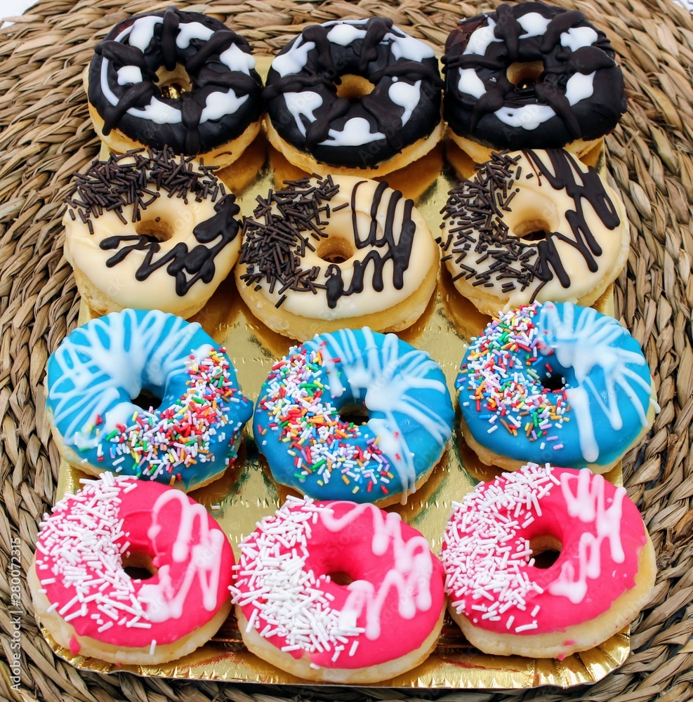 Delicious donuts with colorful chocolate Delicious donuts with colorful chocolate