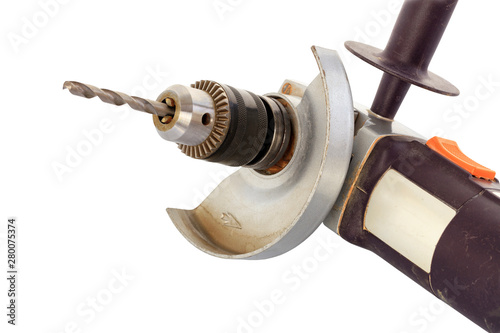 Angle grinder drill, metal keyed drill chuck, stable chuck convertor and drill on the white background, isolated, closeup. photo