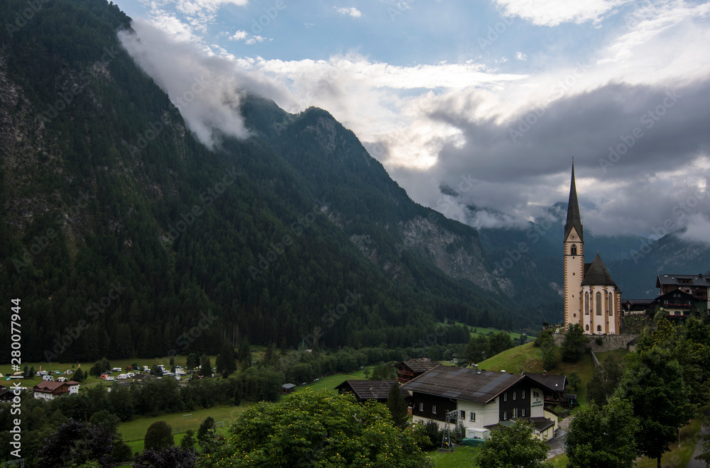 A beautiful village Heiligenblut am Grossglockner surrounded by mountains in Austria