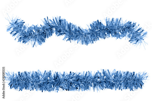 Two Christmas blue tinsel for decoration. White isolate