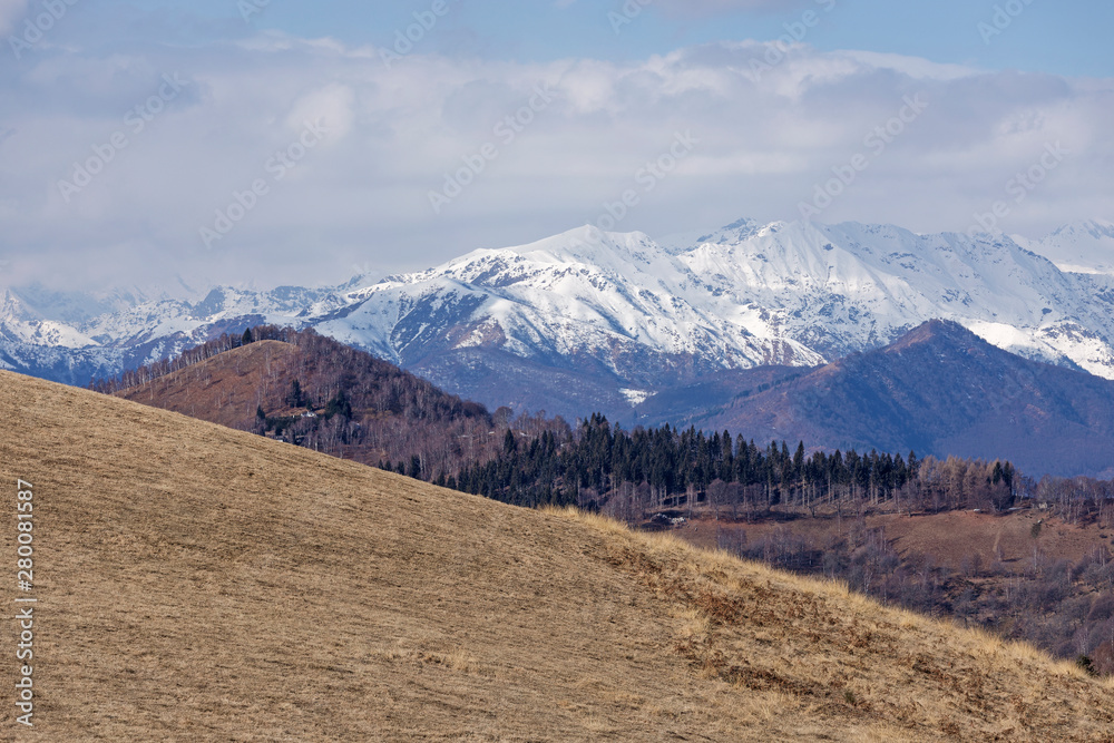 Landscape in the Mottarone mount area with the Monte Rosa massif on the background, Piedmont, Italy.