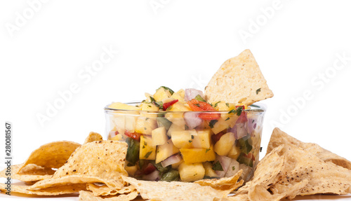 tortilla chips paired with pinnapple salsa   photo