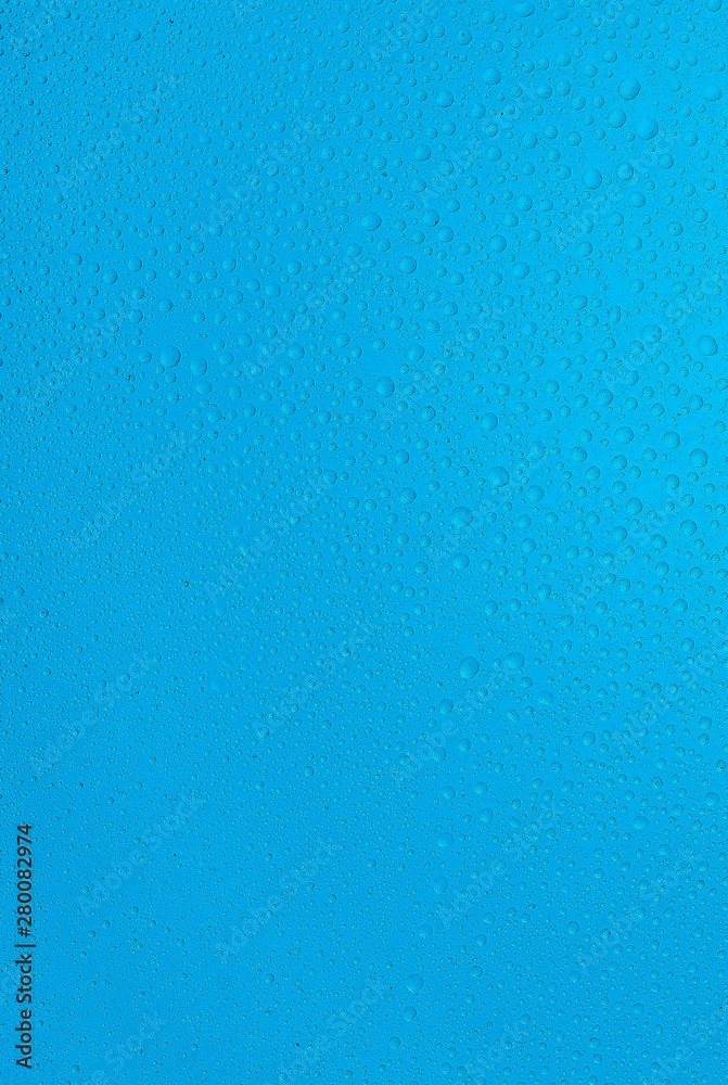 small drops of water on blue background small drops of water on blue background