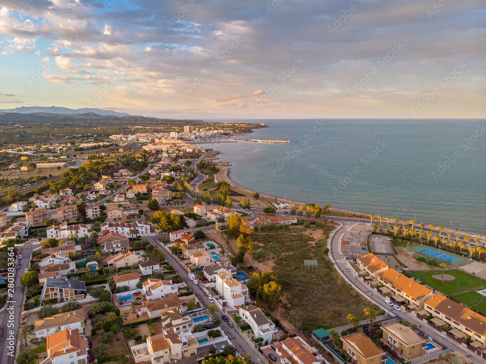 The sunset over L'Ampolla, Catalonia, Spain. Drone aerial photo