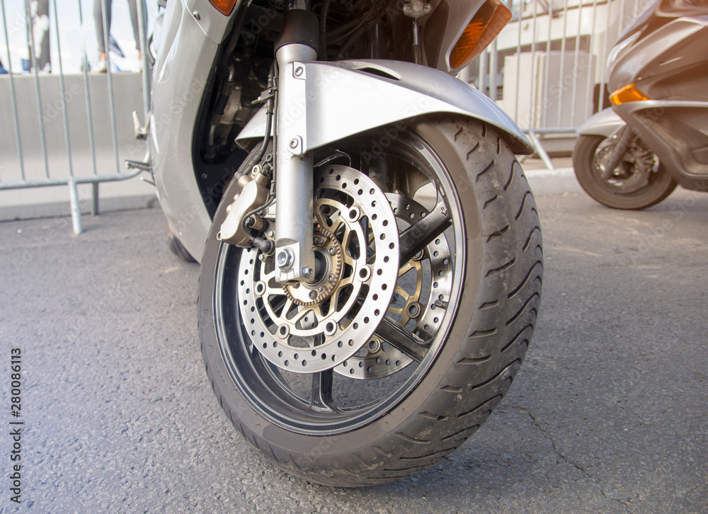 Obraz premium Parked sports bike close-up. The concept of repair service. Motoparts.