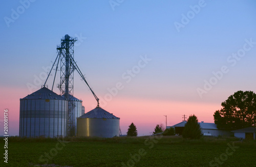 Farm at Dusk, Grain Silo, Trees, Barn, and Fields 2 © AdobeLibrary