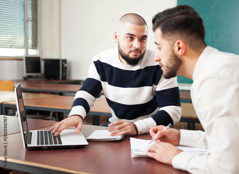 Obraz premium Students preparing for exams in classroom