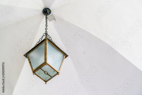 Close up of a vintage bronze chandelier photo