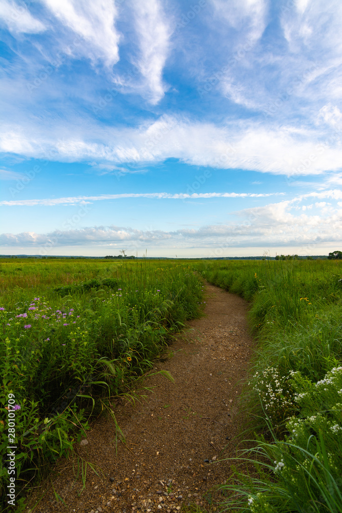 Dirt path at sunrise