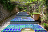 Alley with fountains in the old manor  Granja, Mallorca, Spain