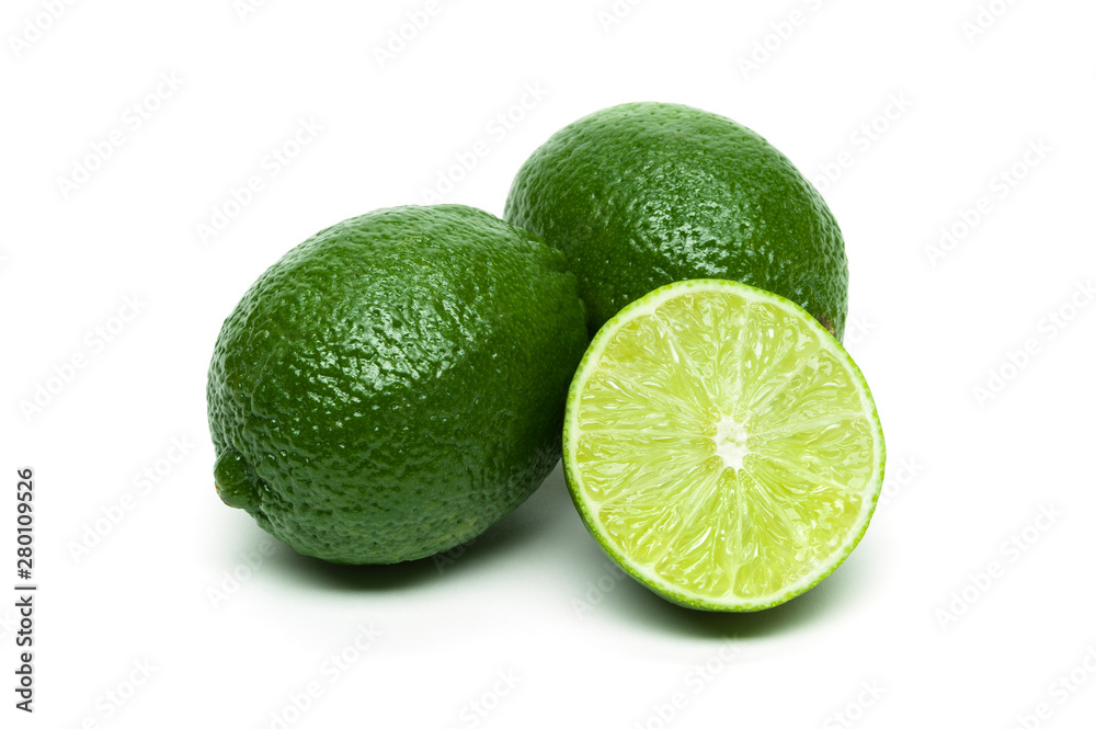 Lime, whole exotic tropical fruits with slice isolated on white background, healthy food, diet nutrition Lime, whole exotic tropical fruits with slice isolated on white background, healthy food, diet nutrition