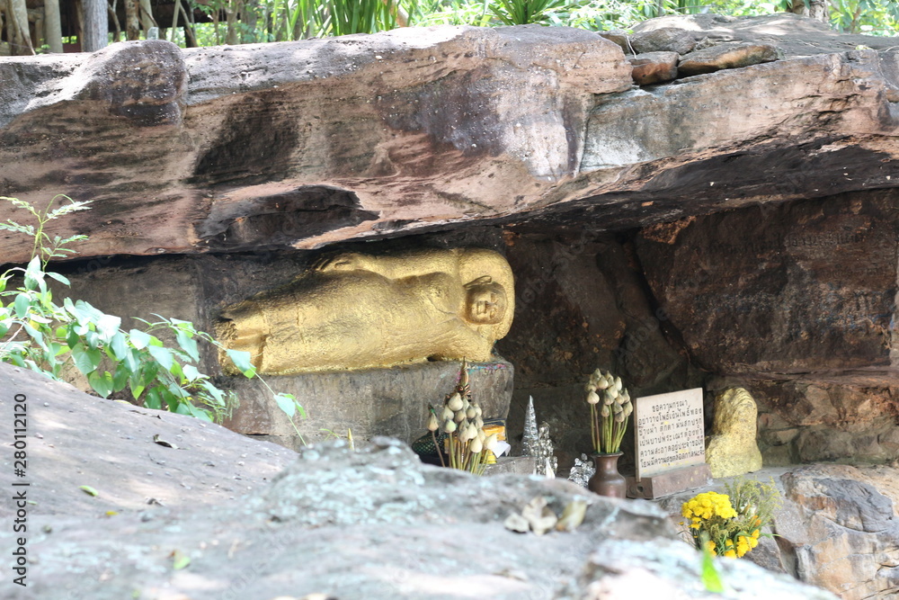 reclining buddha at wat phukow. kalasin, thailand. reclining buddha at wat phukow. kalasin, thailand.