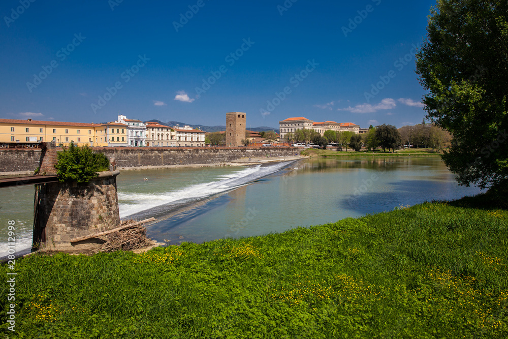 Arno river and Torre della Zecca a defense tower of Florence on the east side of the city Arno river and Torre della Zecca a defense tower of Florence on the east side of the city