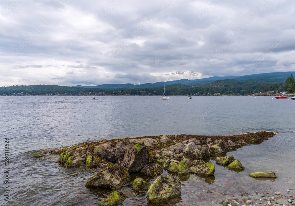 View over Inlet, ocean and island with mountains in beautiful British Columbia. Canada.