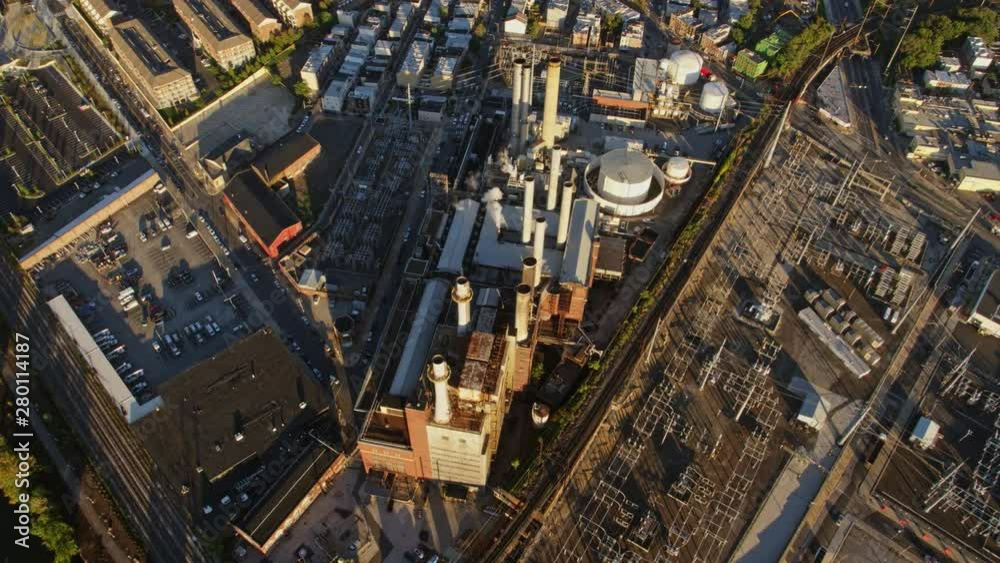 Philadelphia Pennsylvania Aerial v85 Low close up birdseye over Devil�s Pocket Industrial area ascending, panning to cityscape view - October 2017 Philadelphia Pennsylvania Aerial v85 Low close up birdseye over Devil�s Pocket Industrial area ascending, panning to cityscape view - October 2017