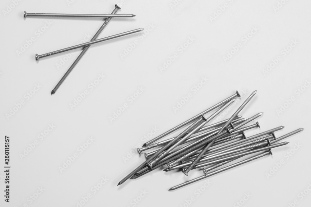 Metal nails isolated on white background. working tools Metal nails isolated on white background. working tools