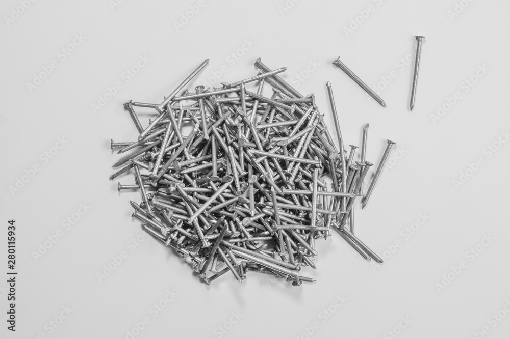Metal nails isolated on white background. working tools Metal nails isolated on white background. working tools